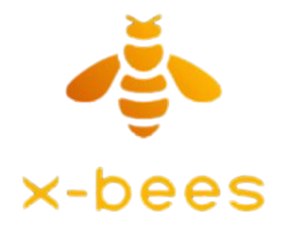 The Wildix x-bees logo, featuring a stylized golden-orange bee icon above the word "x-bees" in a rounded, modern font.