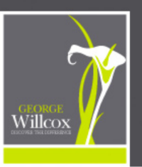 Willcox Granite logo with a white tulip, and grey and green background