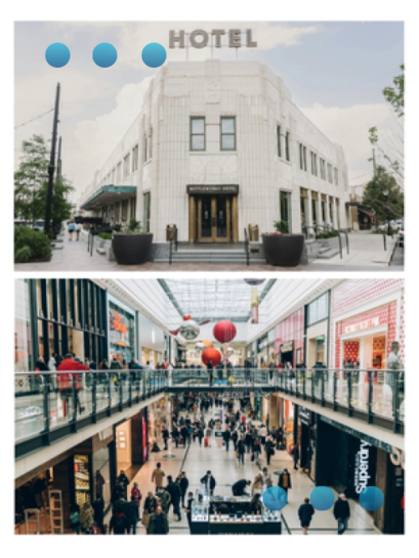 White hotel building and shopping the inside of a shopping centre