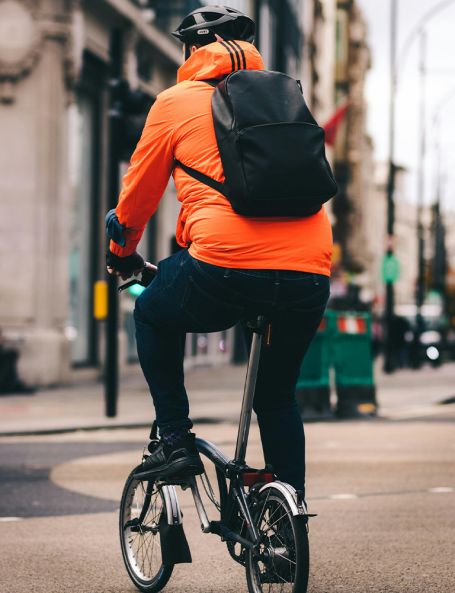 A man cycling to work photo