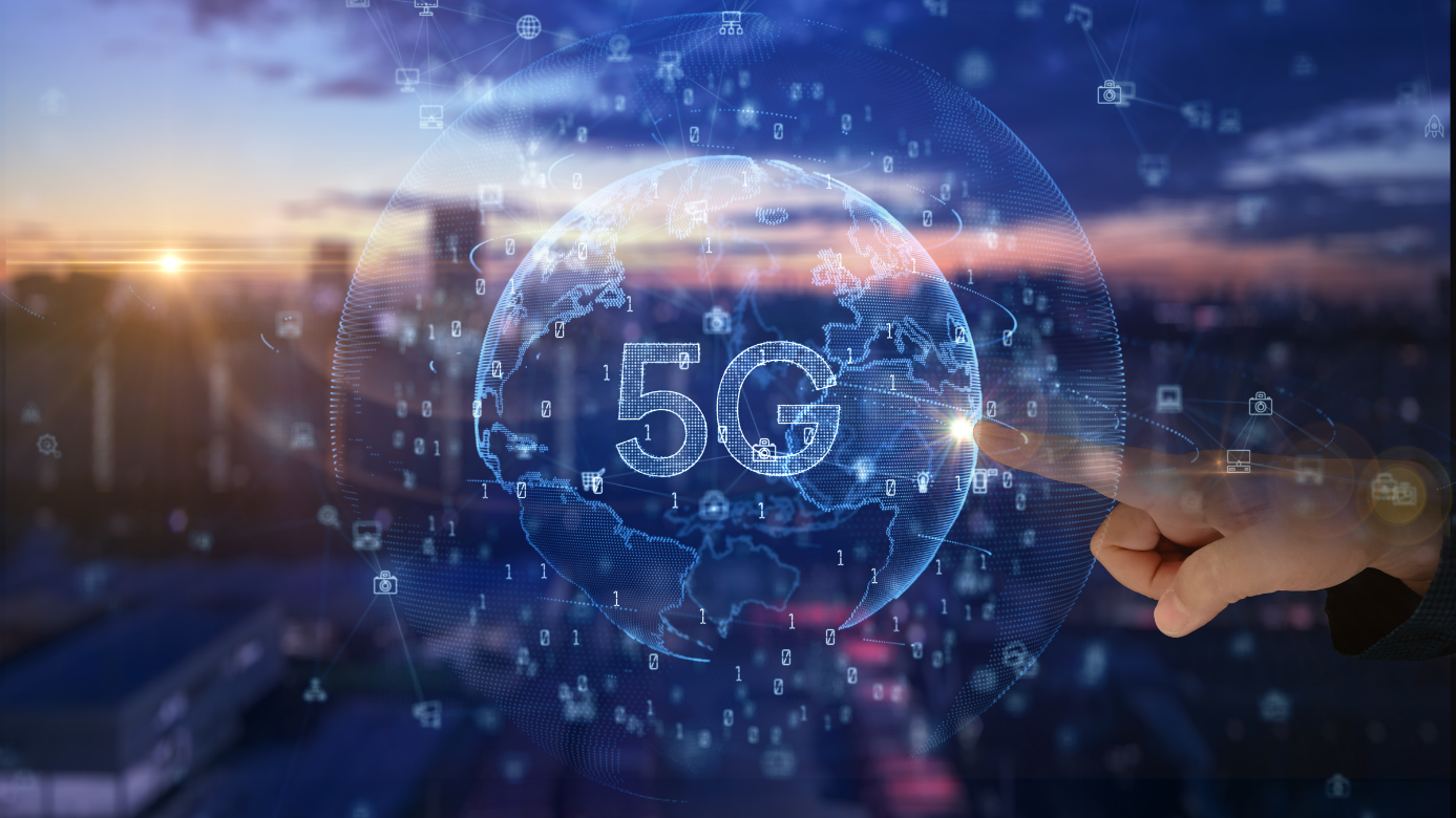 5G letters over a blurred cityscape