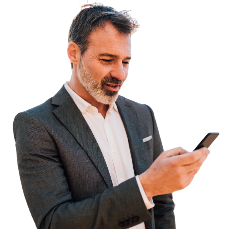 A businessman in a suit on a mobile phone