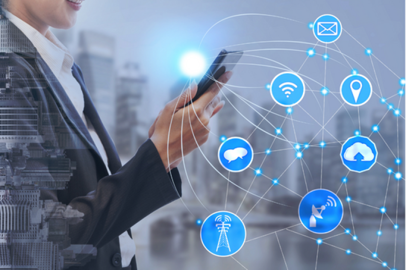 Person holding a mobile phone surrounded by icons