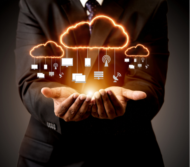 photograph of a person holding cloud telephony icons