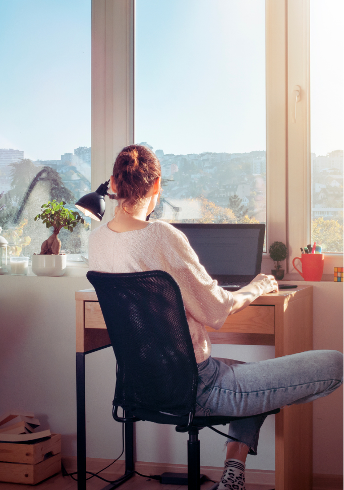remote working female on a laptop