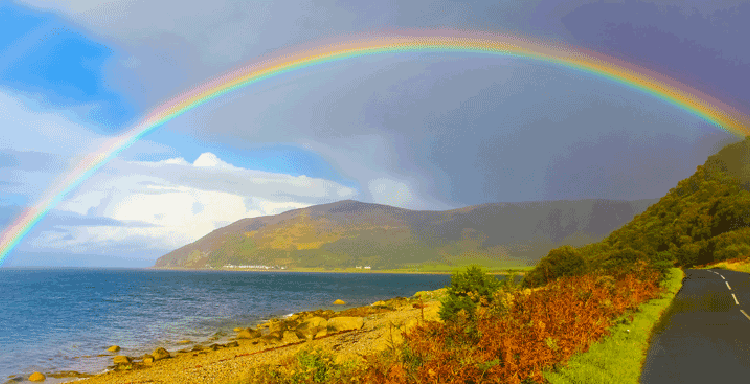 A rainbow over water A rainbow over water