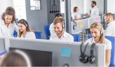 call centre with several people at laptops